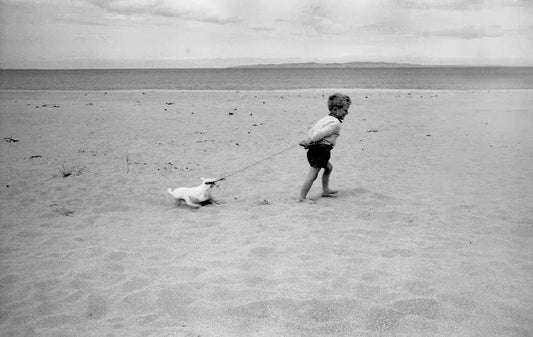 Boy With Dog, by Raymond Martinot-PurePhoto