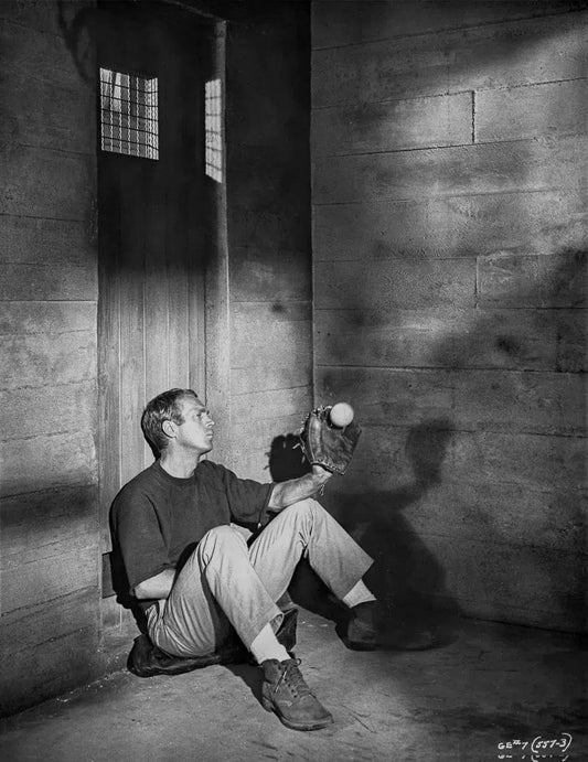 Steve McQueen with baseball on "The Great Escape", from The Wild Ones collection-PurePhoto