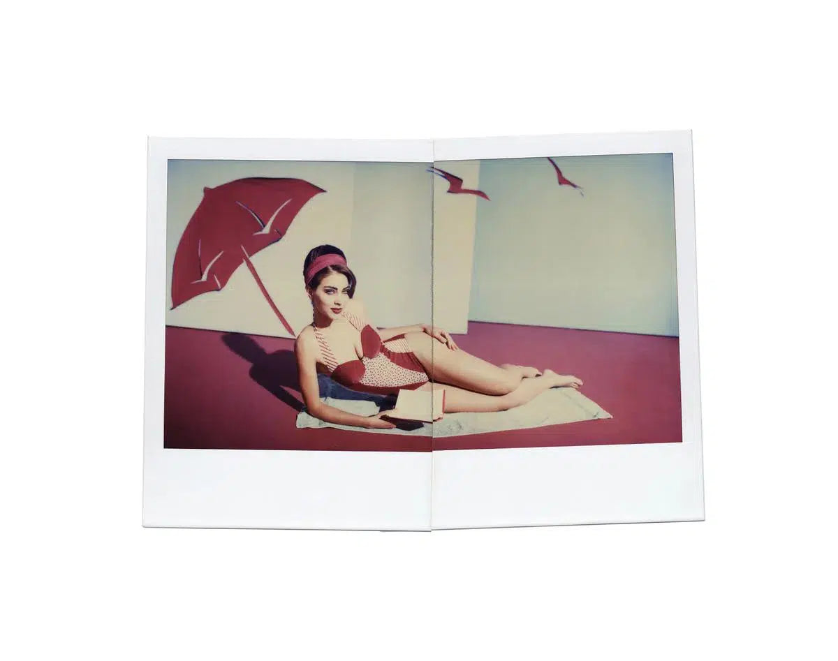 Belle in swimwear with umbrella, by Ivo Von Renner-PurePhoto