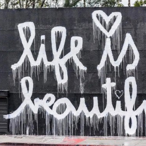 Street art reading life is beautiful, one of the Bay Area photographs in the program